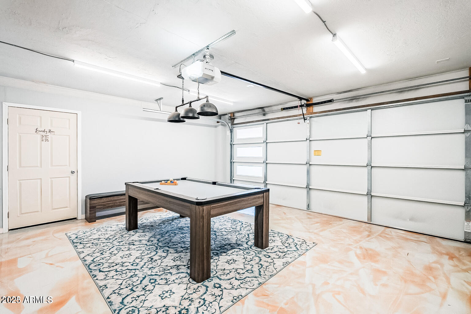 11215 North 37th Avenue Phoenix, AZ 85029 - Photo 20 of 46 a room with lots of wooden cabinets and glass table