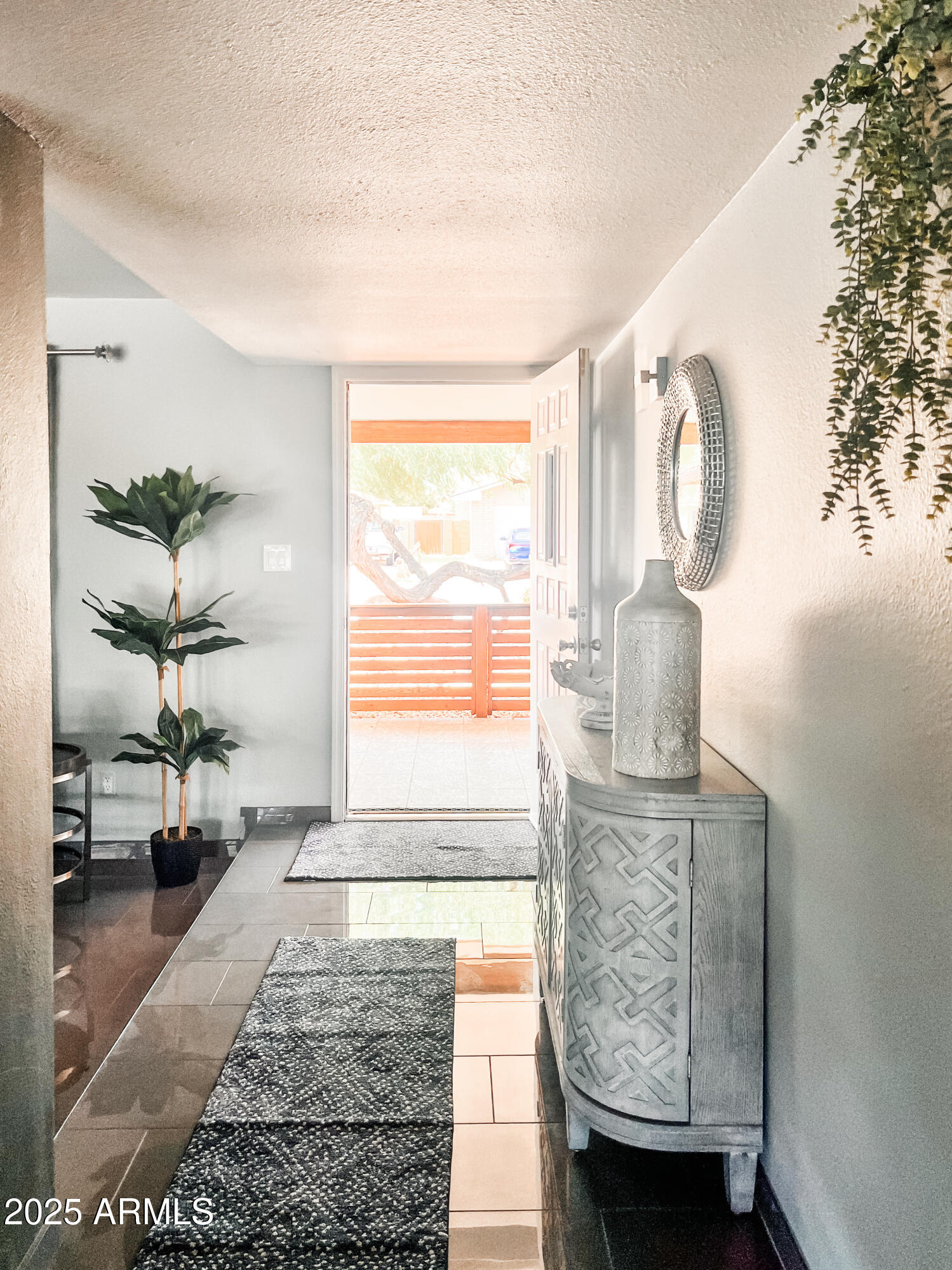 11215 North 37th Avenue Phoenix, AZ 85029 - Photo 27 of 46 a living room with furniture and a window
