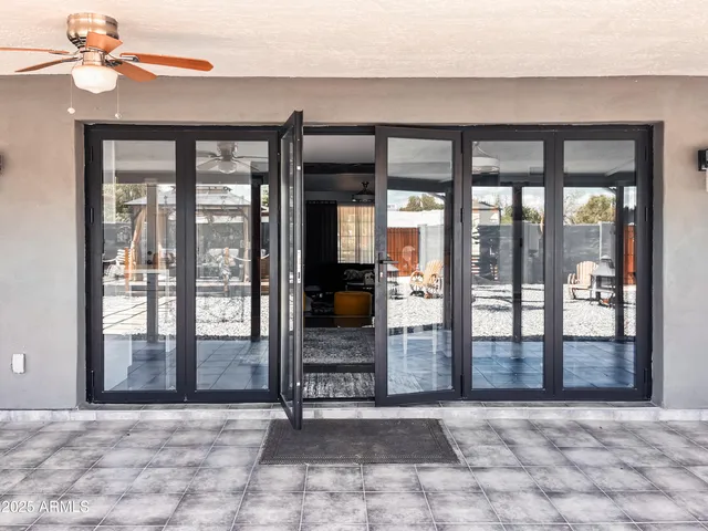 a view of an entryway with a glass door