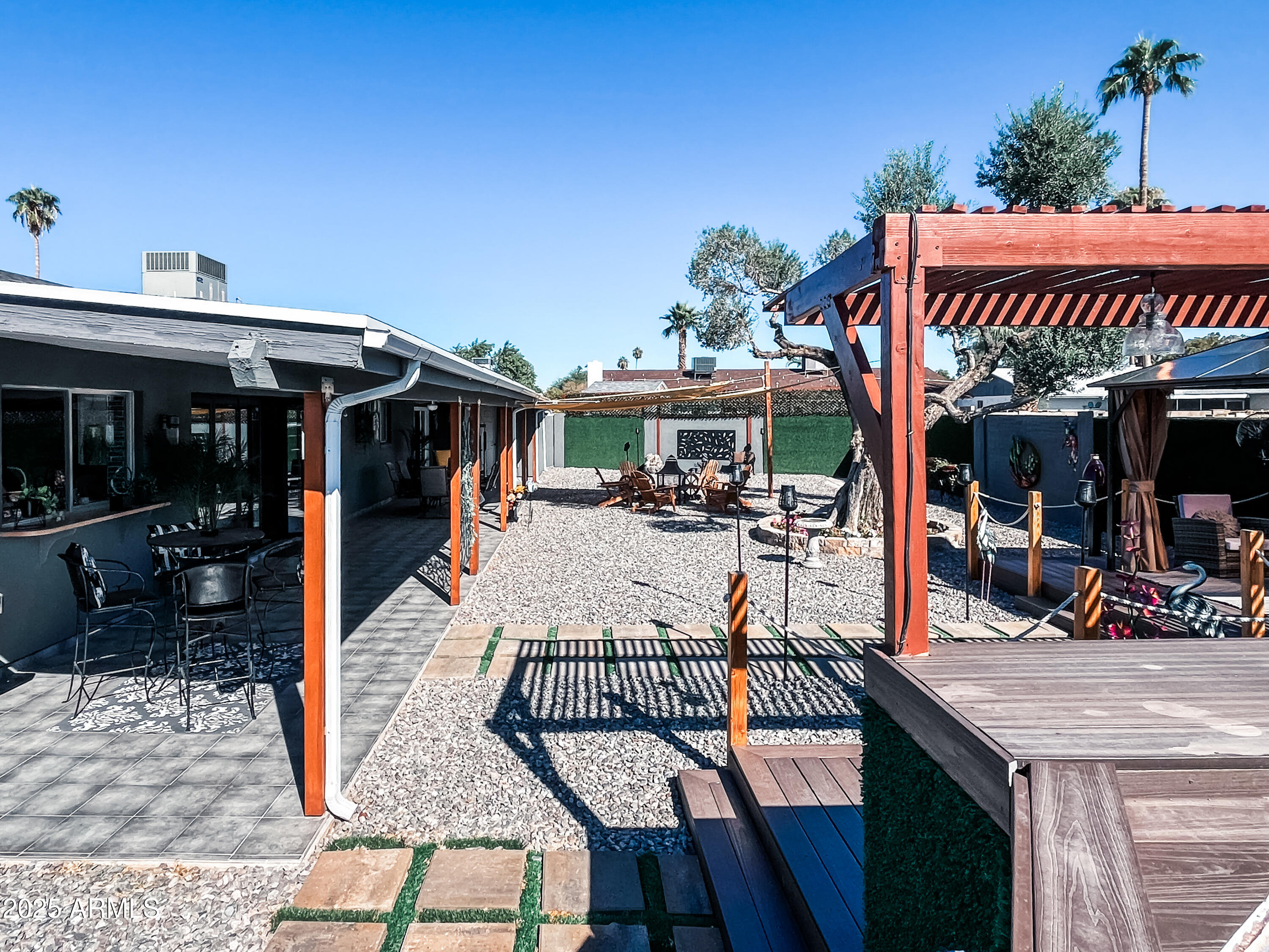 11215 North 37th Avenue Phoenix, AZ 85029 - Photo 45 of 46 a view of a patio with swimming pool table and chairs