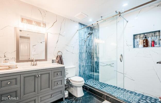 11215 North 37th Avenue Phoenix, AZ 85029 - Photo 7 of 46 a bathroom with a granite countertop sink toilet and shower