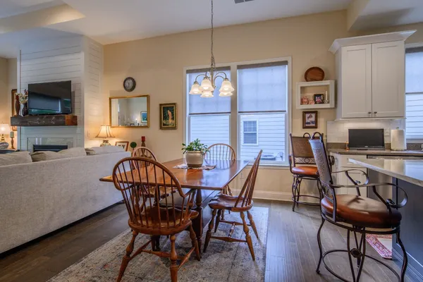 a view of a livingroom with furniture and a flat screen tv