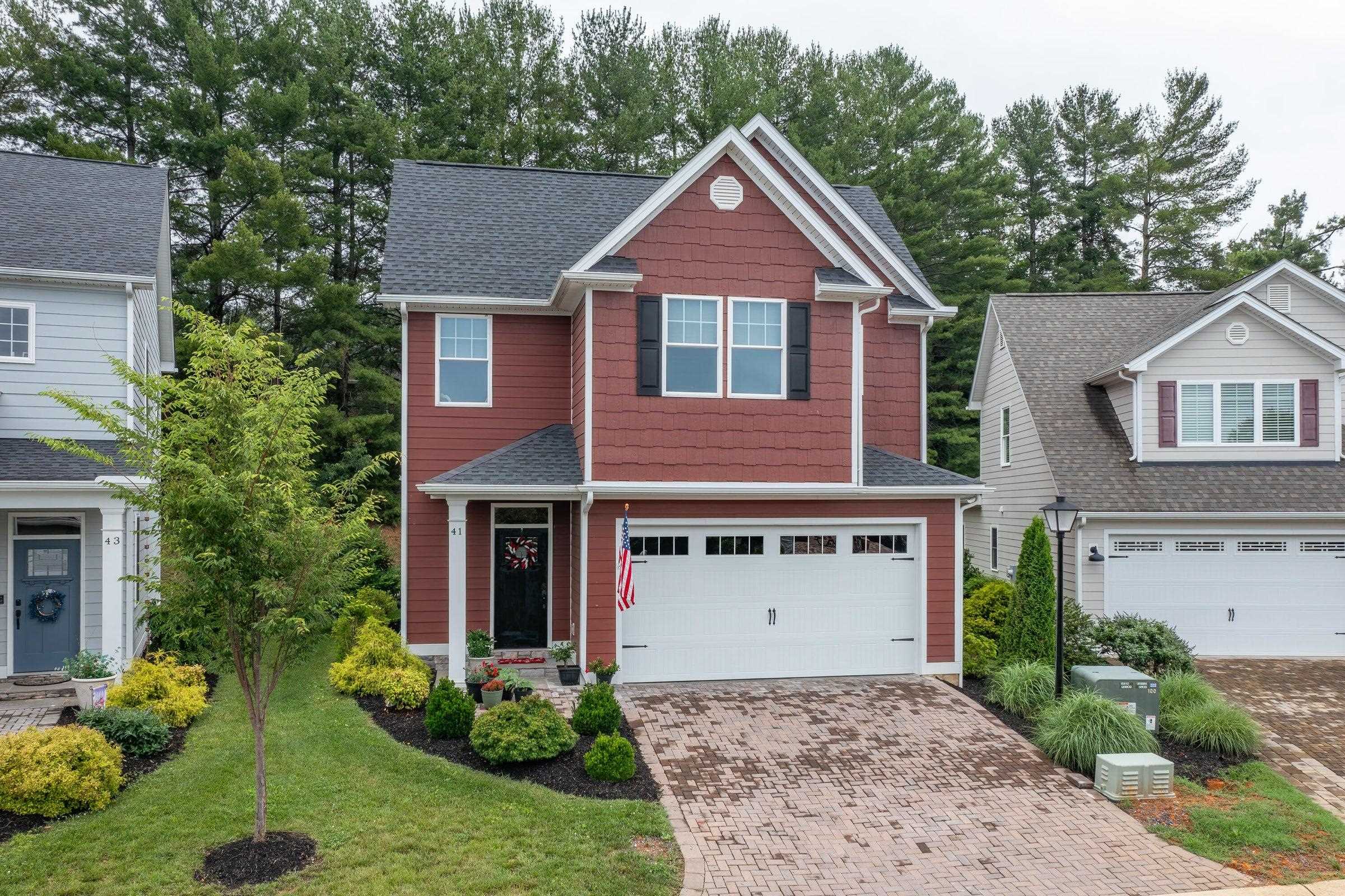 41 Chamberlain Loop Lexington, VA 24450 - Photo 2 of 43 a front view of a house with a yard and trees
