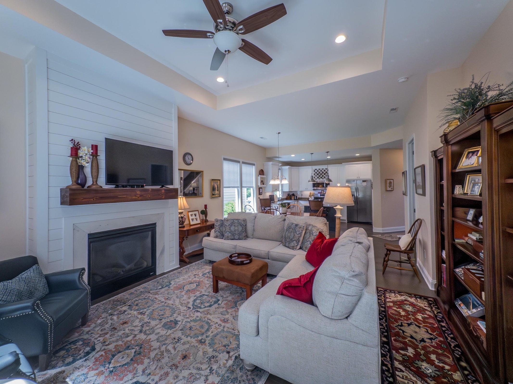 41 Chamberlain Loop Lexington, VA 24450 - Photo 22 of 43 a living room with furniture a fireplace and a flat screen tv