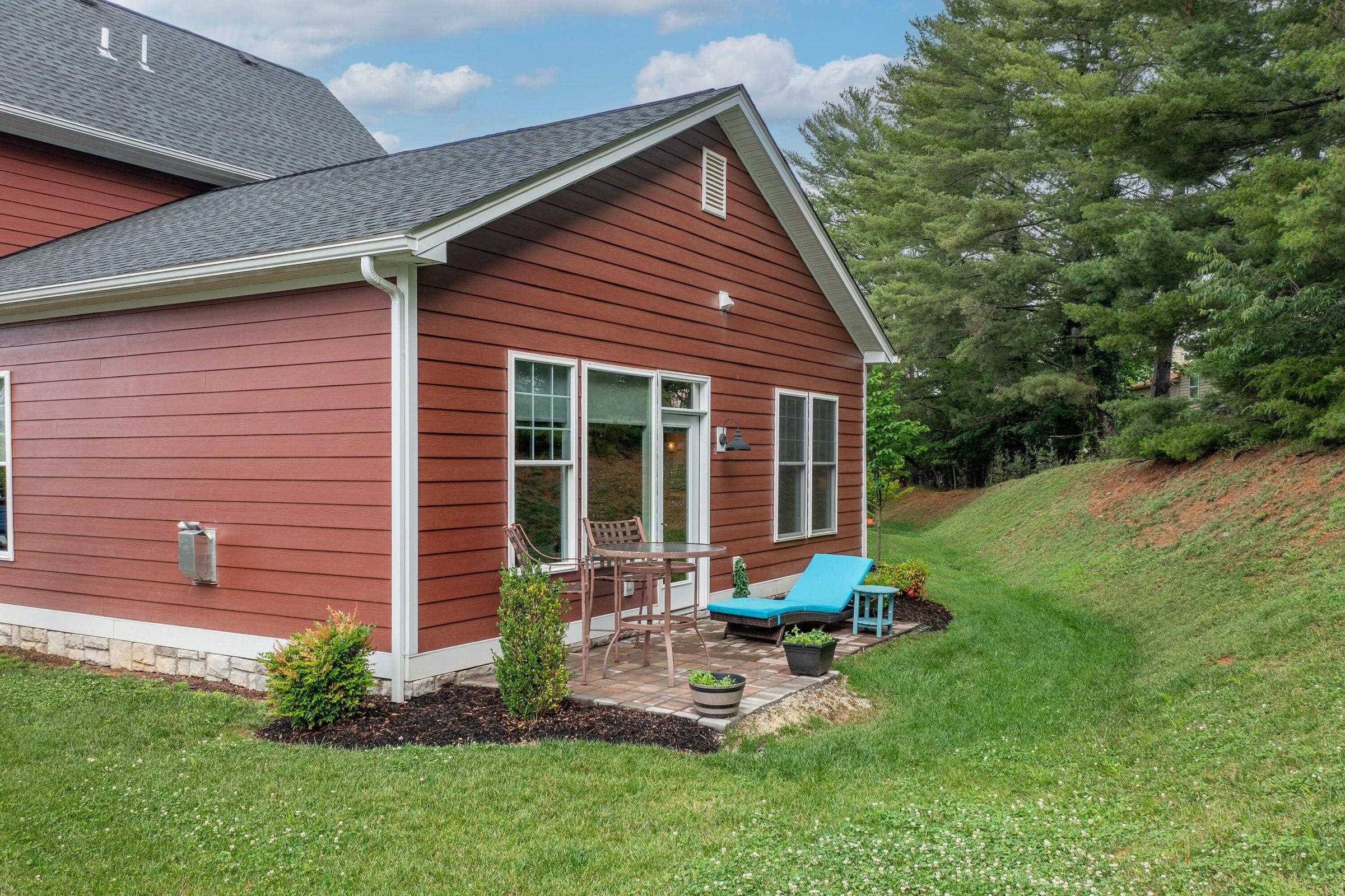 41 Chamberlain Loop Lexington, VA 24450 - Photo 5 of 43 a view of a house with backyard sitting area and garden