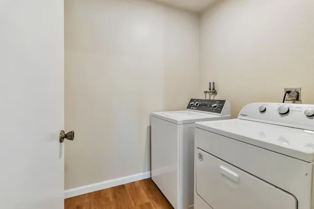 a utility room with dryer and washer