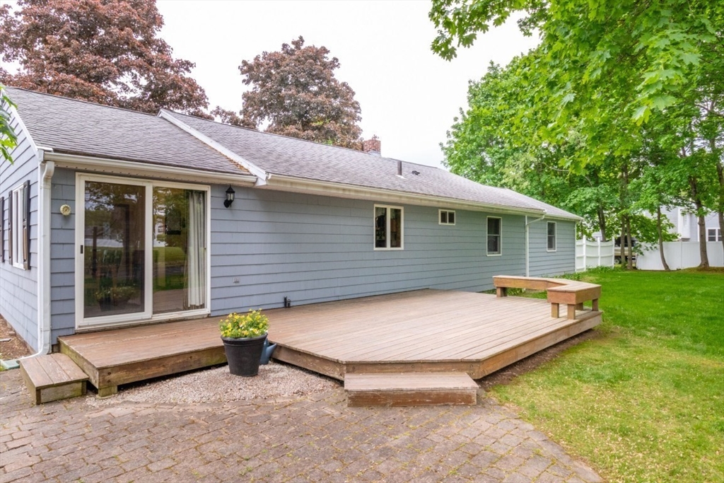 118 Bruce Road Walpole, MA 02081 - Photo 24 of 30 a backyard of a house with yard barbeque oven and green space
