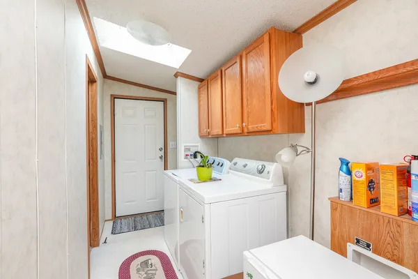 a bathroom with a sink mirror vanity and toilet