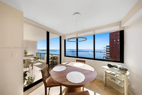 a room with furniture and a large window