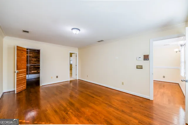 a view of a bathroom with a shower and a sink