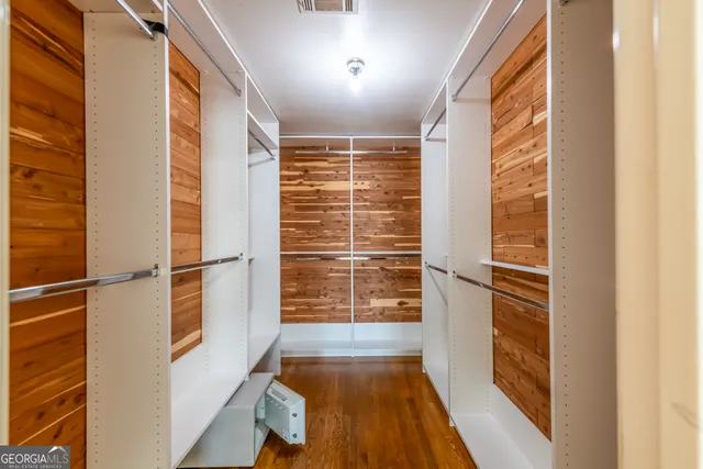 a view of a livingroom with a furniture and a kitchen