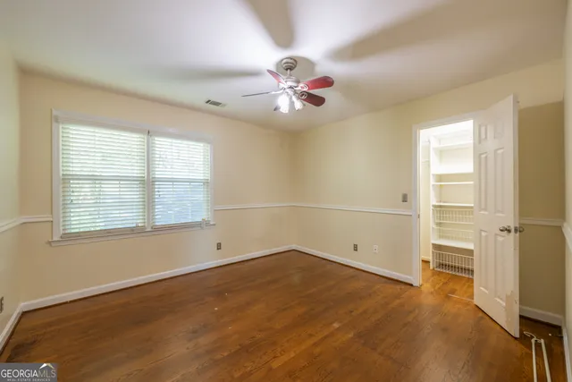 a view of a pathway both side of the house