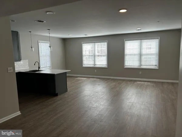 a view of kitchen and windows