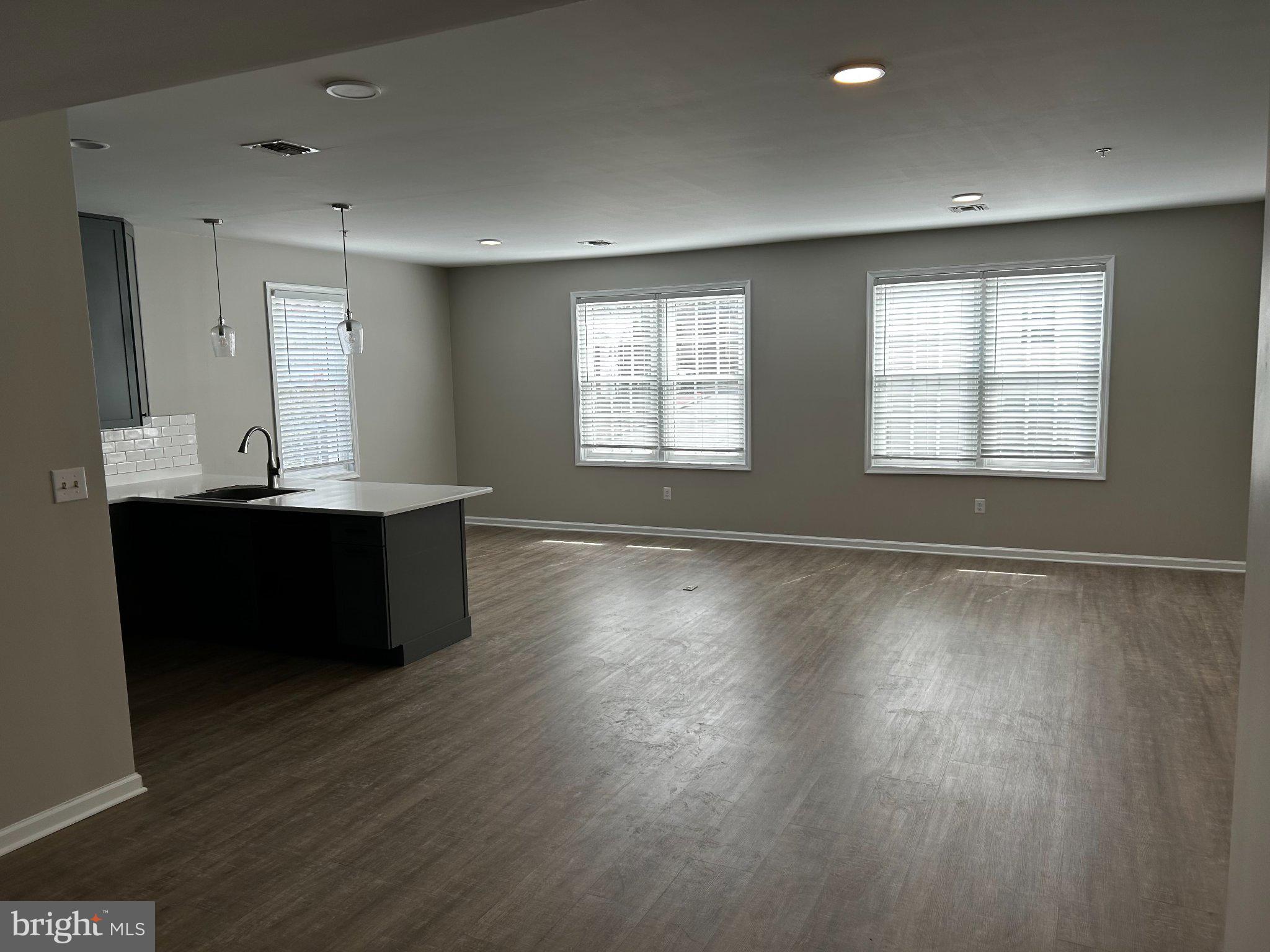 134 Bridge Street, Unit 201 Phoenixville, PA 19460 - Photo 11 of 12 a view of kitchen and windows