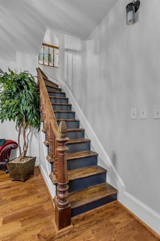 701 Johnson Street Terrell, TX 75160 - Photo 22 of 33 Original staircase with added finial