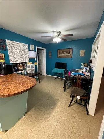 a room with furniture and a flat screen tv