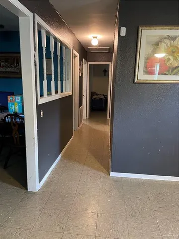 a view of gallery with hallway