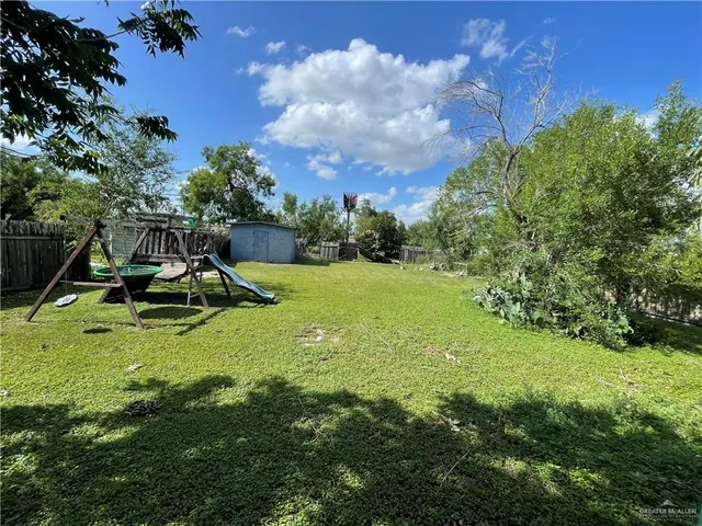 a view of a park with a slide