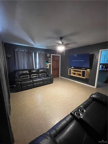 a view of kitchen with stove and cabinets