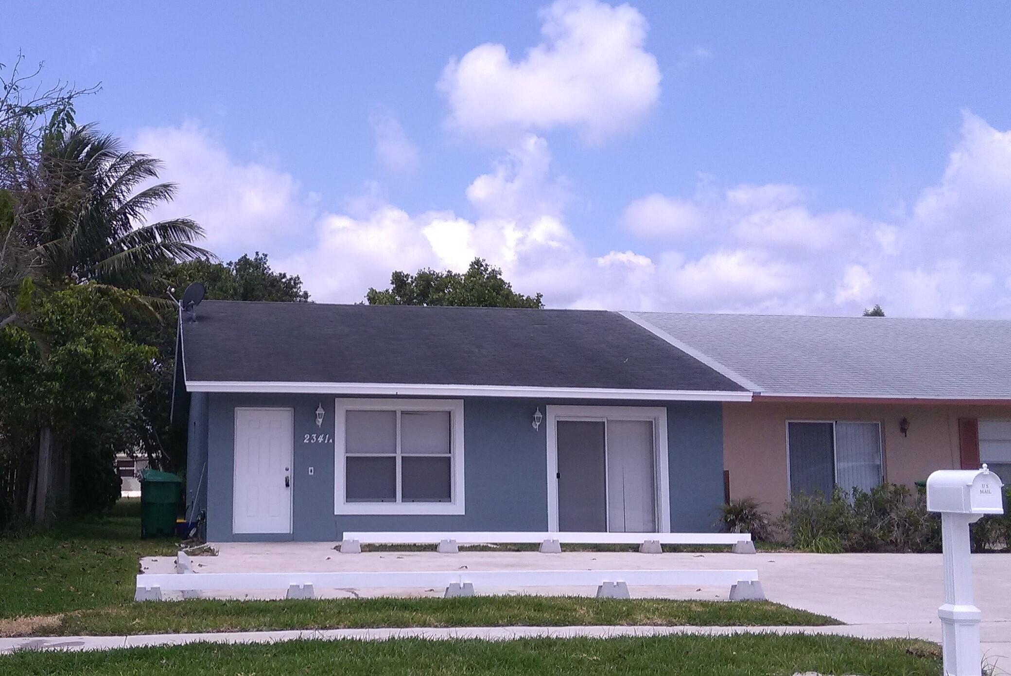 2341 Avenue Z, Unit A Riviera Beach, FL 33404 - Photo 1 of 16 1. Front (2)