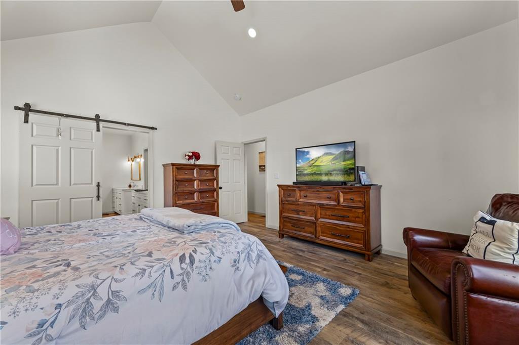 1308 Highway 82 Winder, GA 30680 - Photo 24 of 54 a bedroom with a bed and furniture