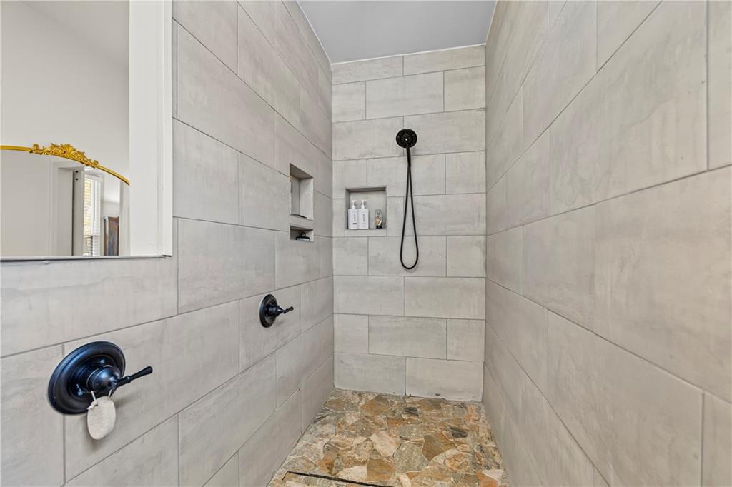 1308 Highway 82 Winder, GA 30680 - Photo 27 of 54 a bathroom with a shower