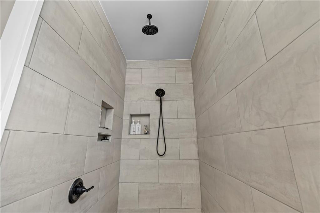 1308 Highway 82 Winder, GA 30680 - Photo 28 of 54 a bathroom with a shower