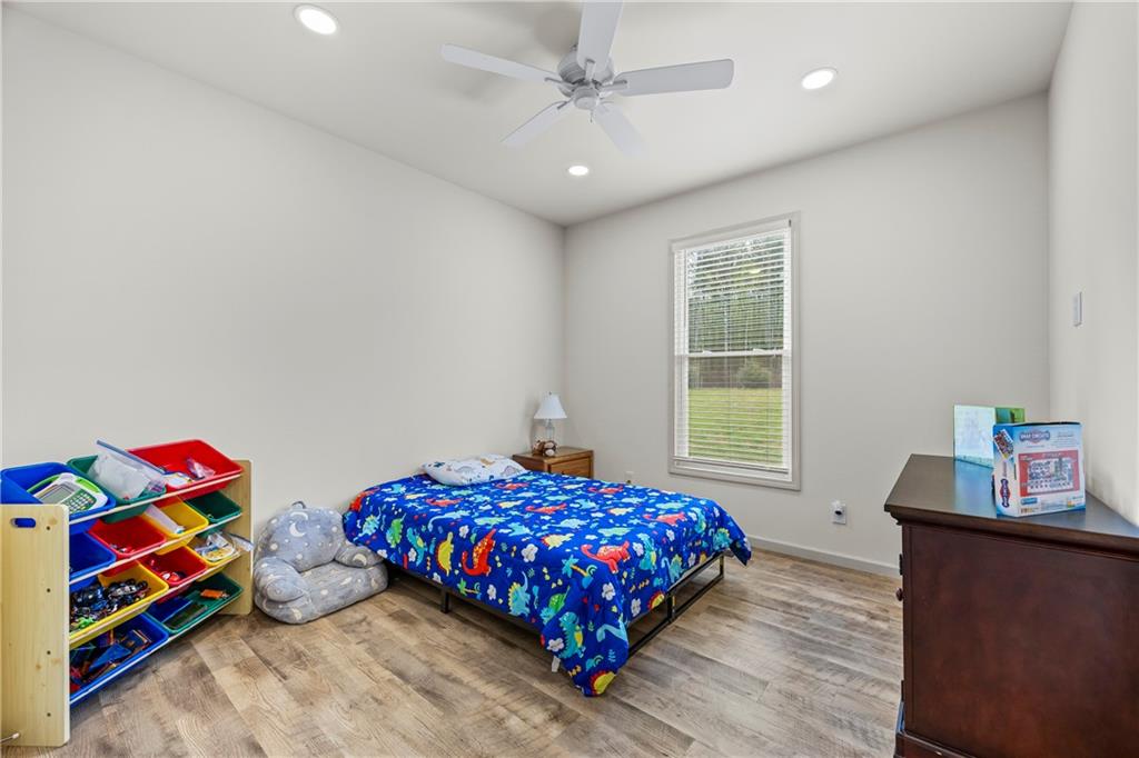1308 Highway 82 Winder, GA 30680 - Photo 29 of 54 a bedroom with bed and a window