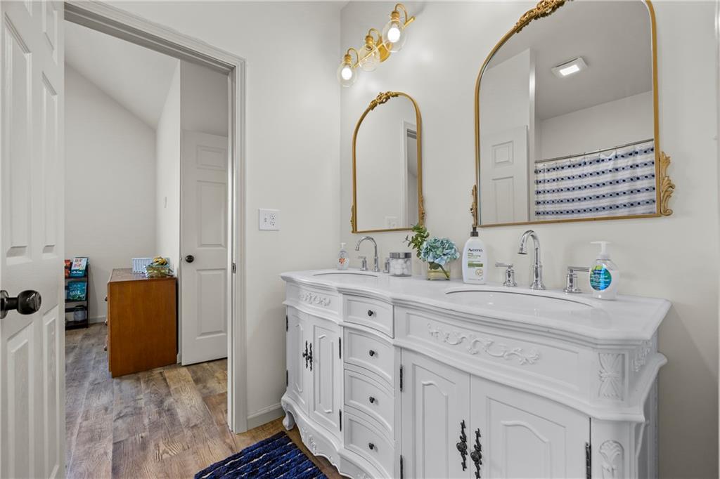 1308 Highway 82 Winder, GA 30680 - Photo 31 of 54 a spacious bathroom with a double vanity sink mirror and
