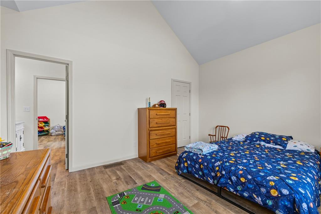 1308 Highway 82 Winder, GA 30680 - Photo 35 of 54 a bedroom with bed and dresser