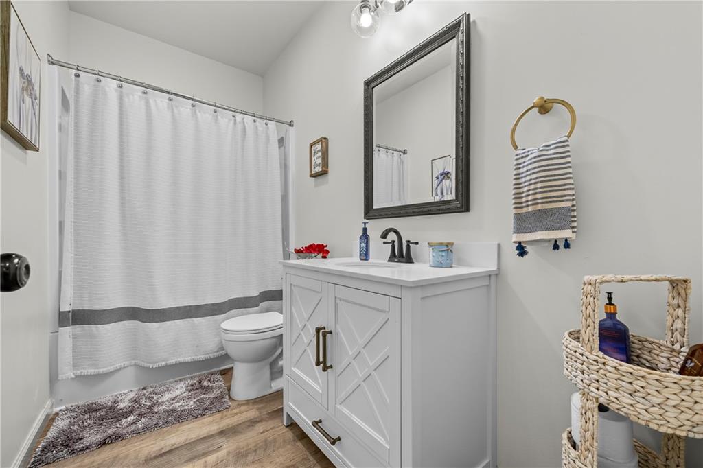 1308 Highway 82 Winder, GA 30680 - Photo 38 of 54 a bathroom with a sink toilet and shower