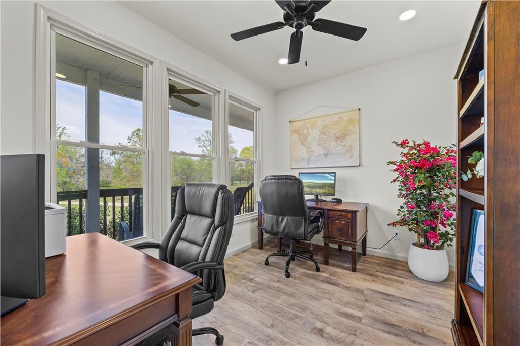 1308 Highway 82 Winder, GA 30680 - Photo 39 of 54 a view of a workspace with furniture and a potted plant