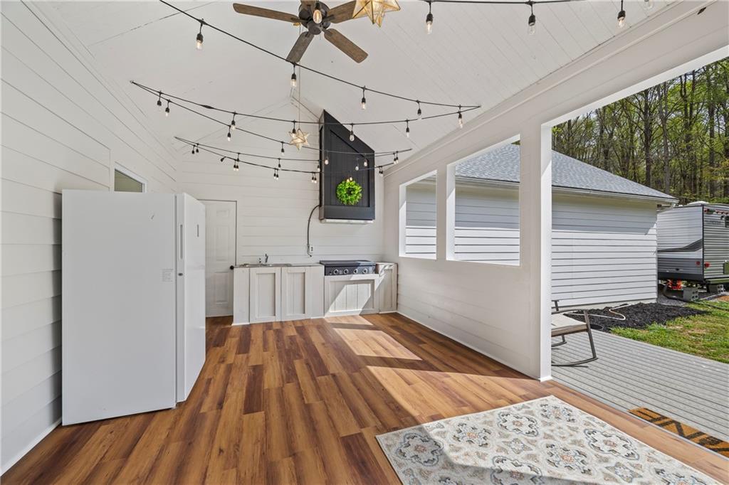 1308 Highway 82 Winder, GA 30680 - Photo 40 of 54 a view of a backyard with wooden floor
