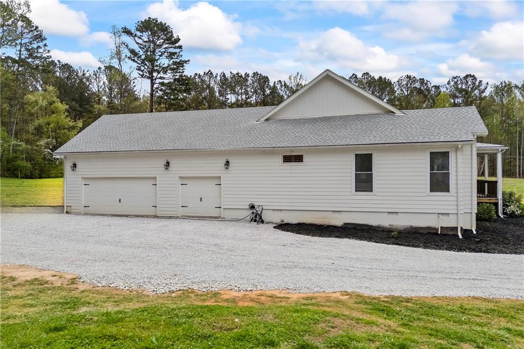 1308 Highway 82 Winder, GA 30680 - Photo 46 of 54 a view of a house with a yard