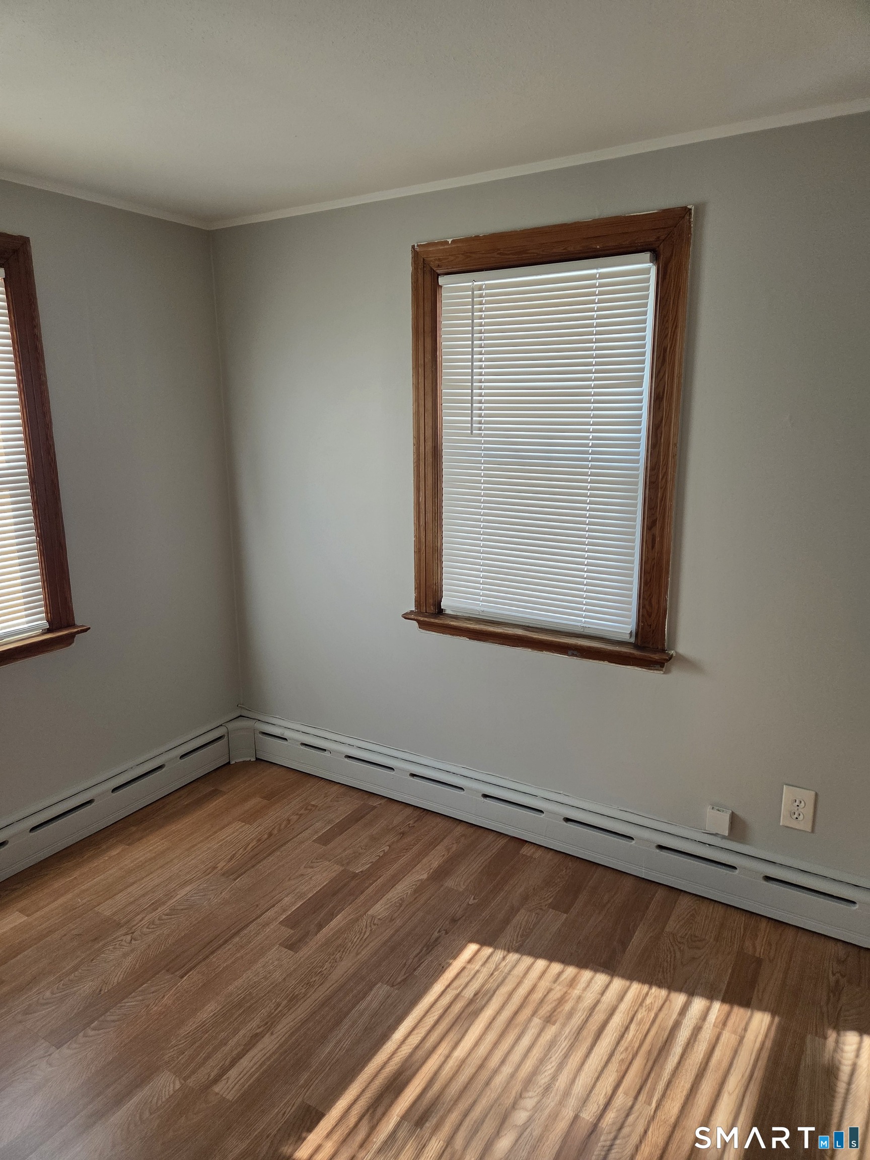 1372 New Haven Road Naugatuck, CT 06770 - Photo 5 of 11 a view of a room with wooden floor and a window