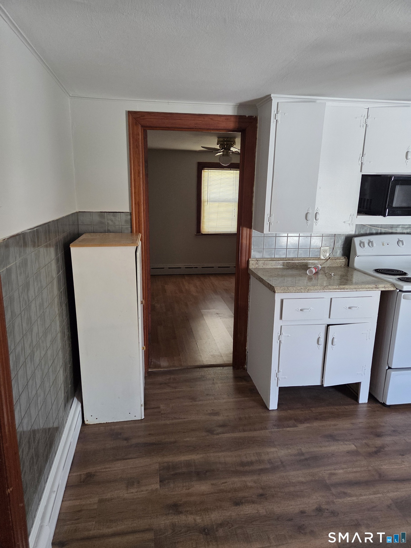 1372 New Haven Road Naugatuck, CT 06770 - Photo 8 of 11 a kitchen with a refrigerator sink and cabinets