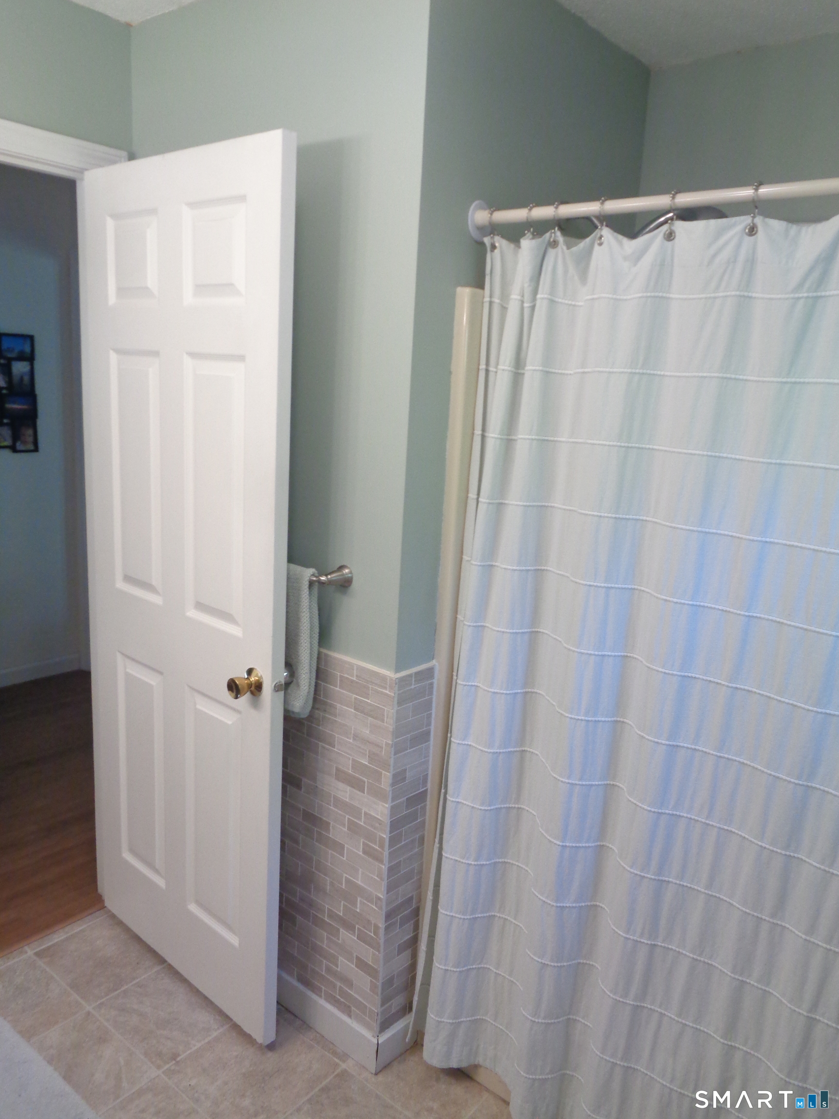 321 Spring Street Naugatuck, CT 06770 - Photo 9 of 27 a bathroom with a shower and a tub