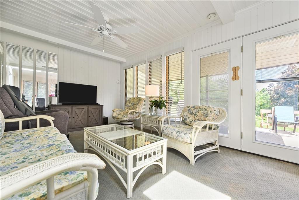 1323 Oakridge Road Bridgeville, PA 15017 - Photo 17 of 36 a living room with furniture and a flat screen tv