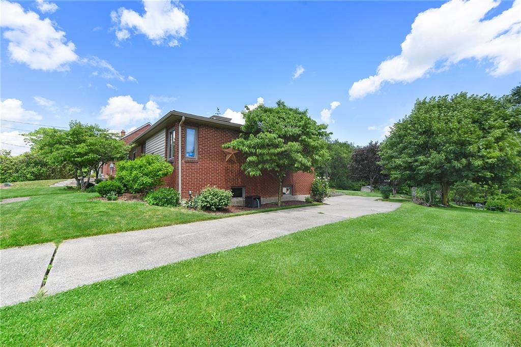 1323 Oakridge Road Bridgeville, PA 15017 - Photo 36 of 36 a house view with a garden space