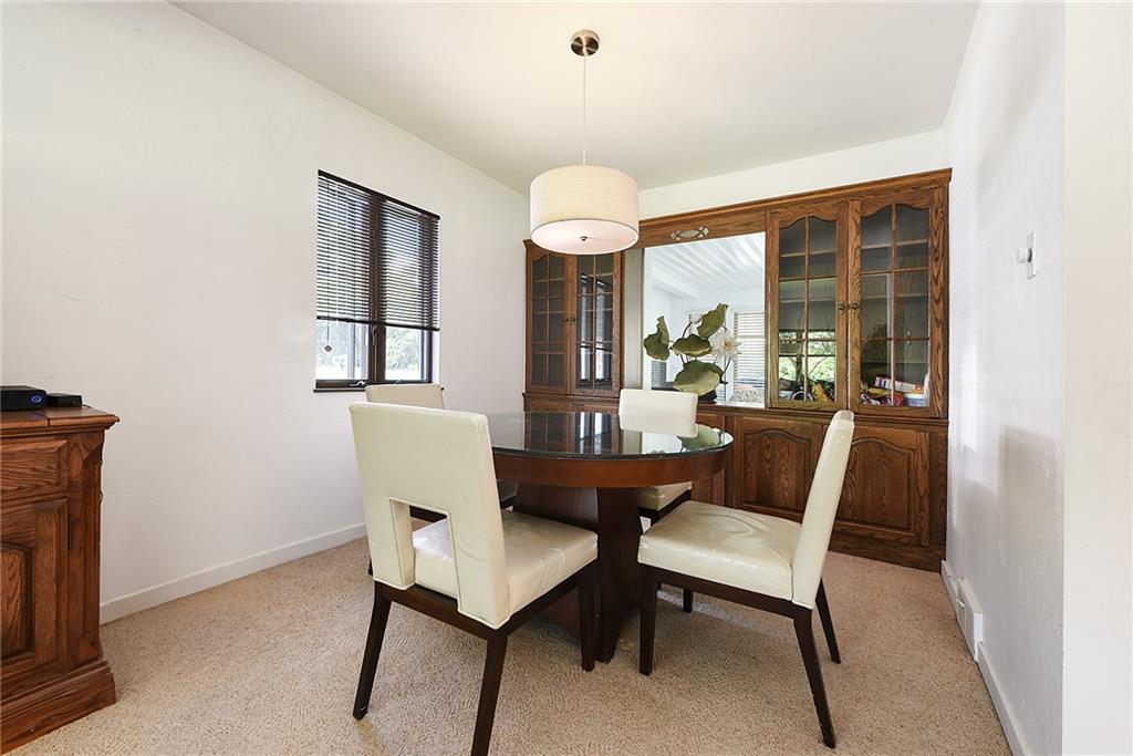 1323 Oakridge Road Bridgeville, PA 15017 - Photo 8 of 36 a dining room with furniture and window