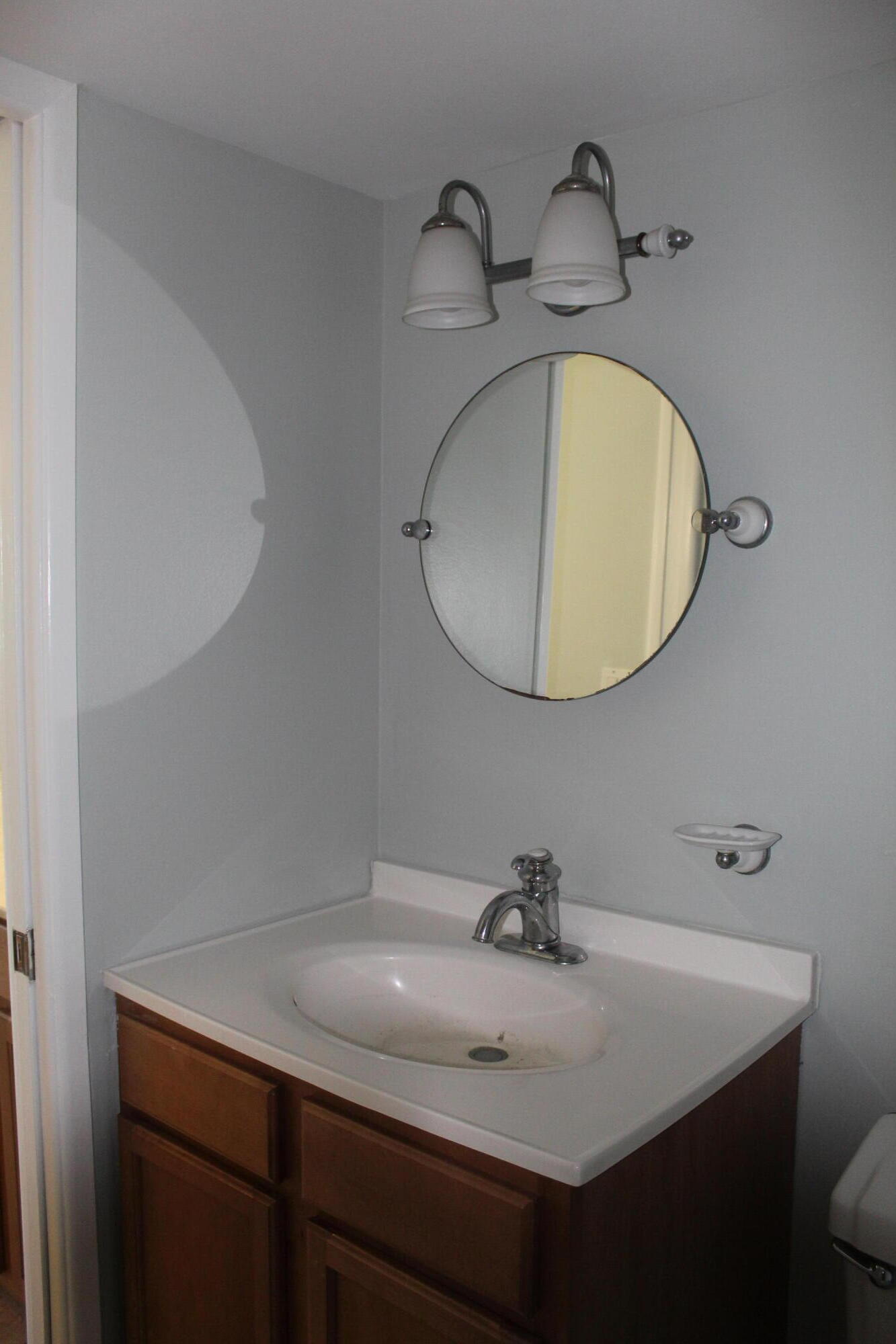 1617 Minutemen Causeway, Unit 202 Cocoa Beach, FL 32931 - Photo 11 of 20 a bathroom with a sink and a mirror