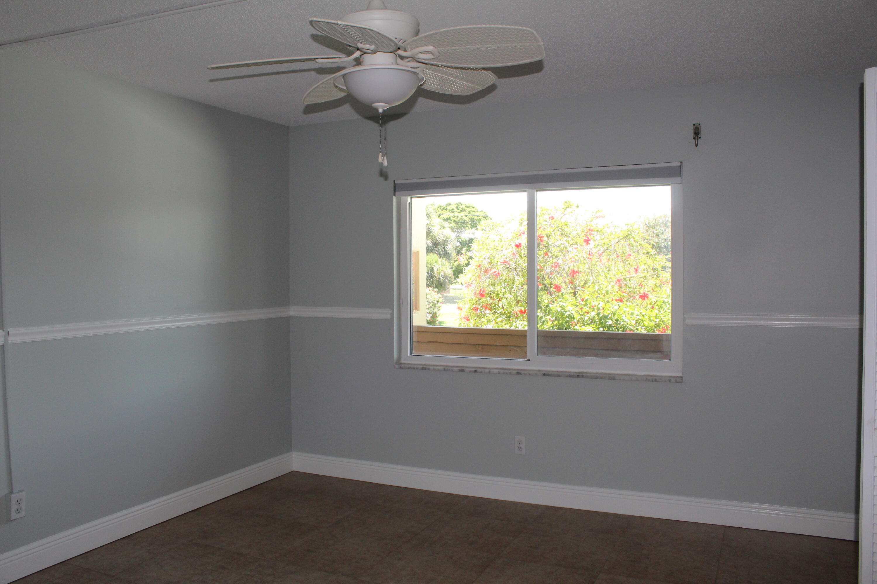 1617 Minutemen Causeway, Unit 202 Cocoa Beach, FL 32931 - Photo 14 of 20 an empty room with a window