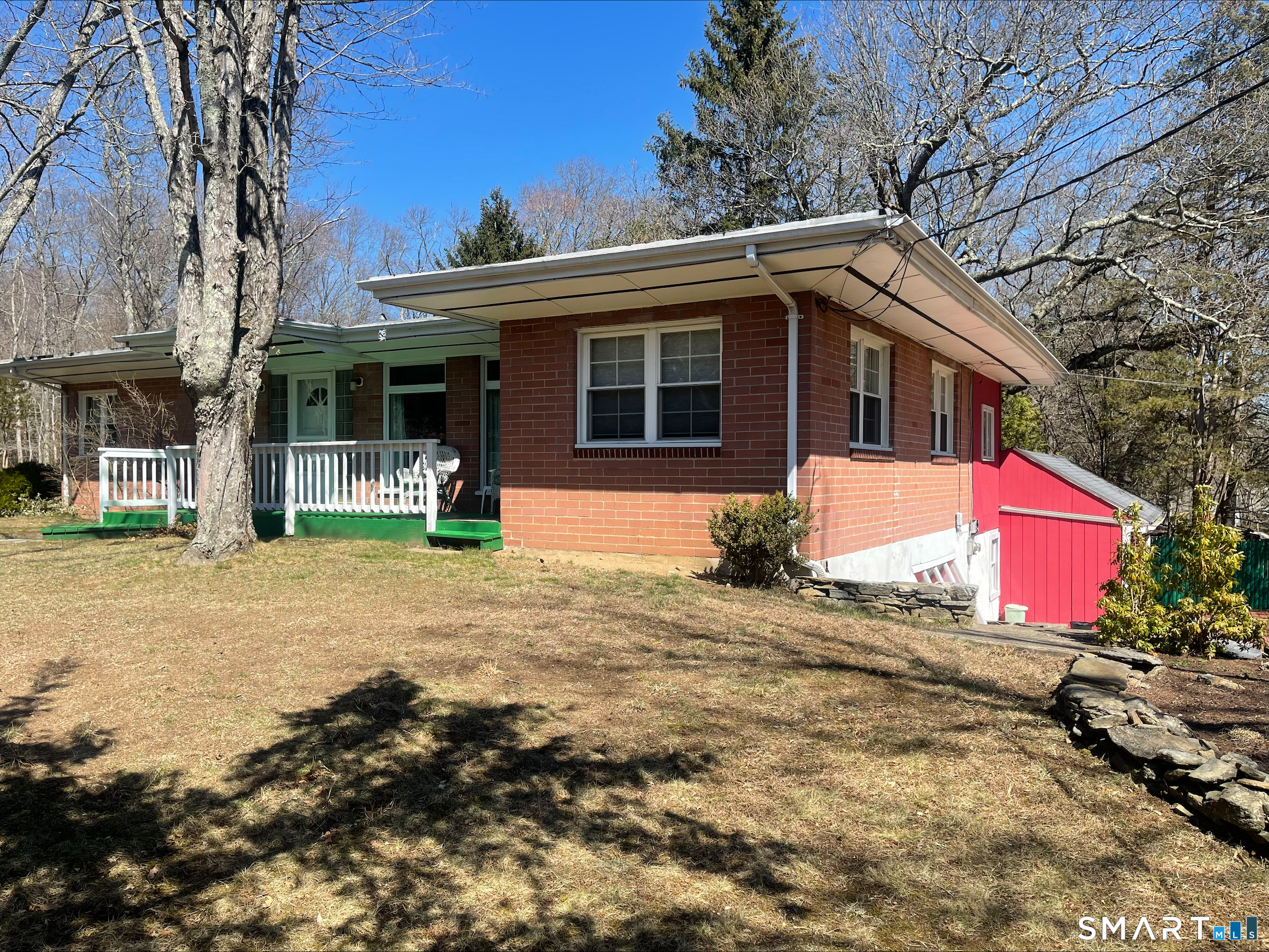 102 West Bridge Street Deep River, CT 06417 - Photo 3 of 35 a front view of a house with a yard