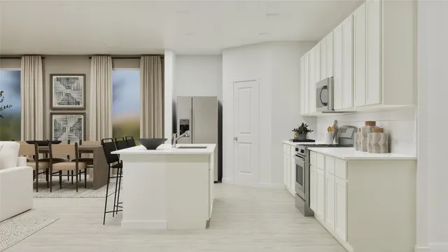 a kitchen with stainless steel appliances kitchen island granite countertop a refrigerator and a stove top oven