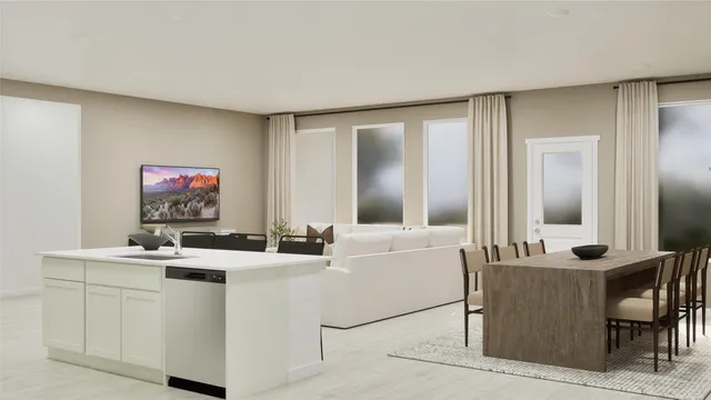 a room with a sink cabinets and a wooden floor