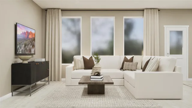 a living room with furniture and a lamp