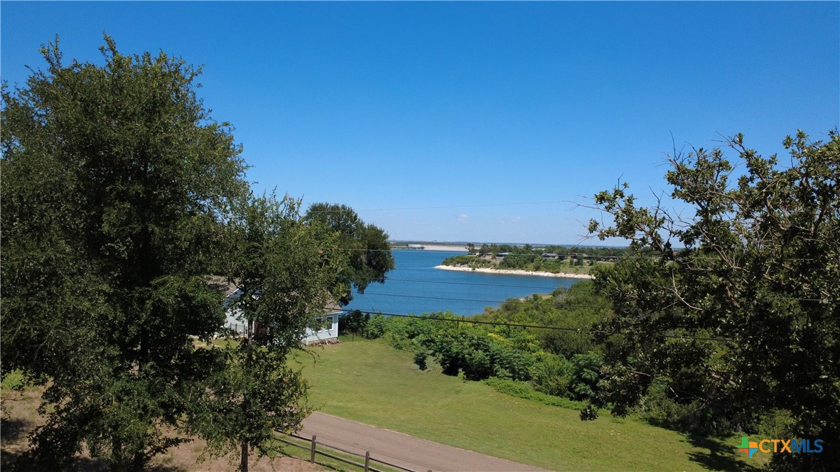 Lot 4 Smoke Signal Road Belton, TX 76513 - Photo 4 of 6 a view of a lake with a city