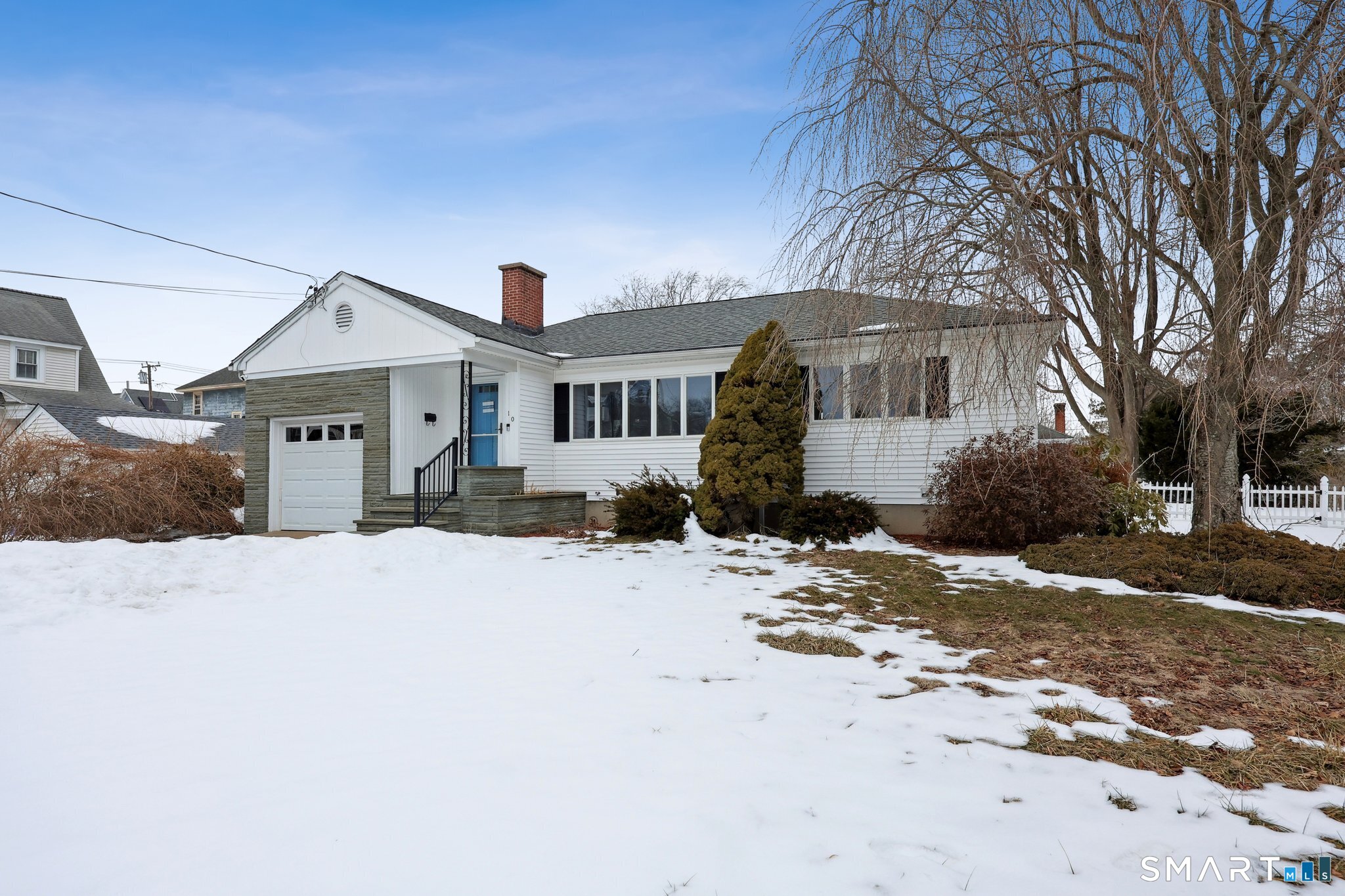 10 Hislop Street New London, CT 06320 - Photo 2 of 25 a front view of a house with a yard