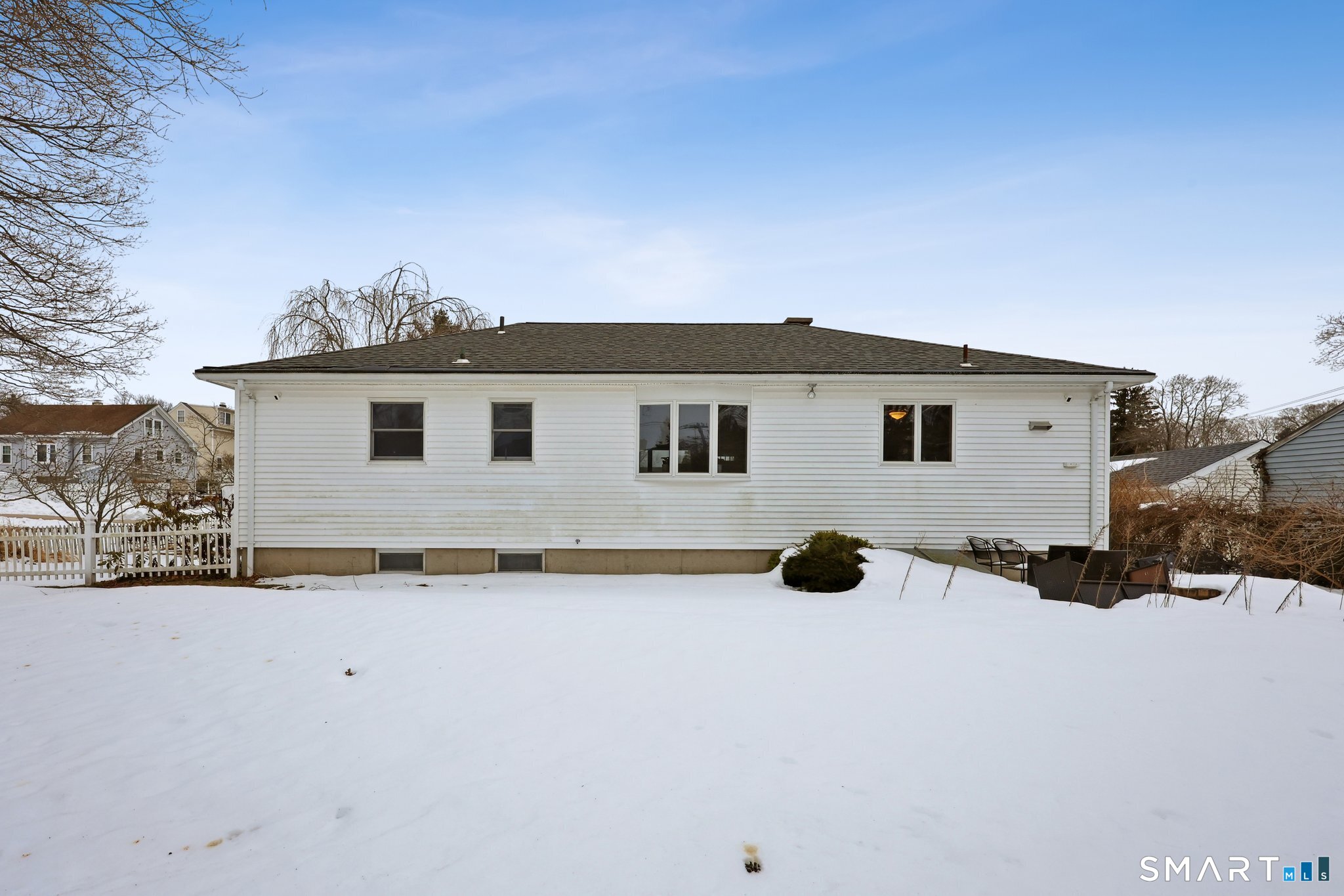 10 Hislop Street New London, CT 06320 - Photo 21 of 25 a view of a house with a yard covered in snow