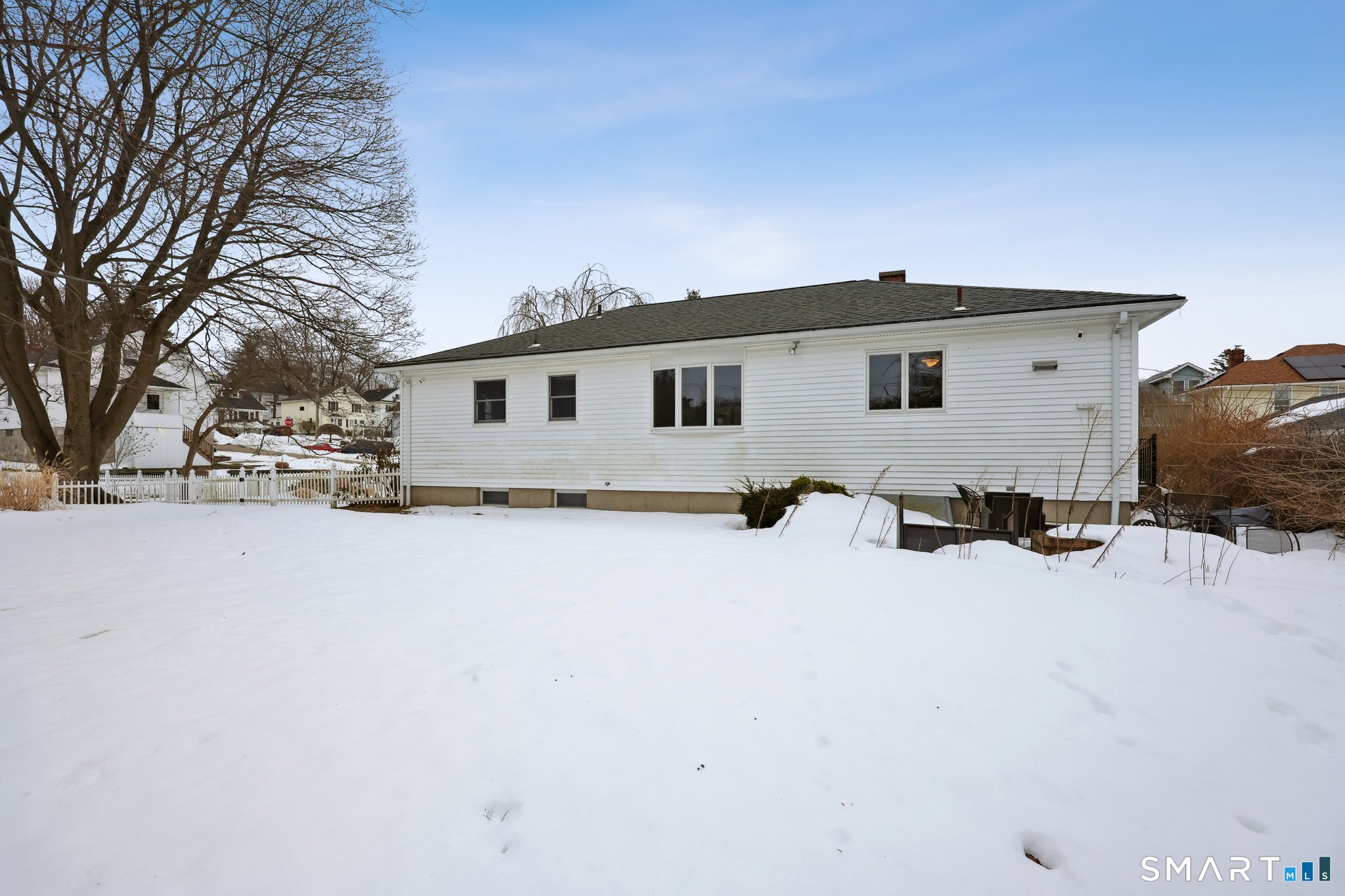 10 Hislop Street New London, CT 06320 - Photo 22 of 25 a view of house with a yard covered in snow